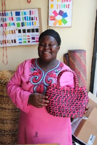 Aidah showing me a sample from her handbag business